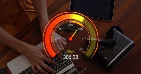 visual shows emphasis on rapid internet connectivity, highlighting speed data display on laptop amongst hands typing and virtual reality device. useful for illustrating concepts of fast online communication and technology usage in digital content, it solutions, and promotional materials for internet service providers.