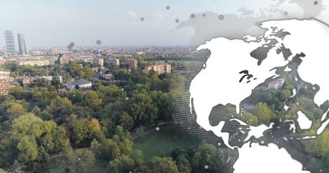 Halftone World Map Overlaying Aerial Urban Greenery View