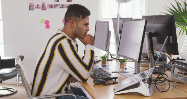 Focused Man Working on Computer in Modern Office - Download Free Stock Images Pikwizard.com