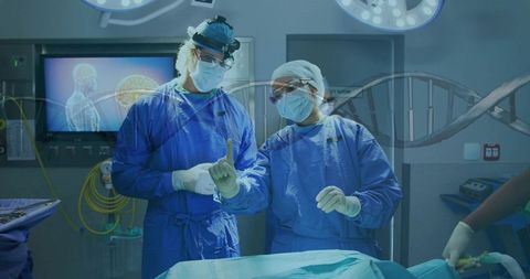 Surgeons Collaborating During Neurosurgery with Brain Monitor and DNA Data Overlay
