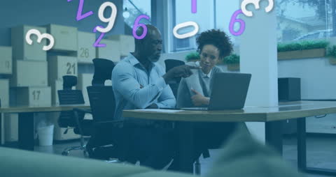 Colleagues Collaborating on Laptop with Floating Digital Numbers