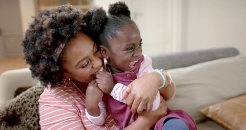 Affectionate Mother and Daughter Bonding at Home