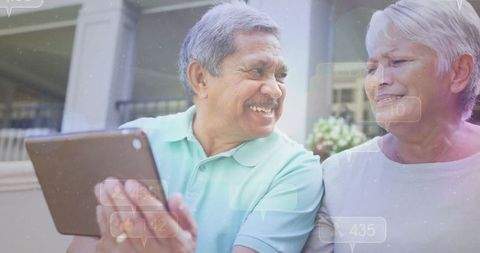 Senior Couple Bonding with Digital Technology Outdoors
