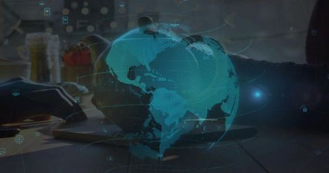 Holographic globe projecting over collaborative workspace with digital network overlay