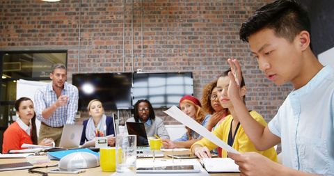 Diverse Team Engaged in a Creative Office Meeting