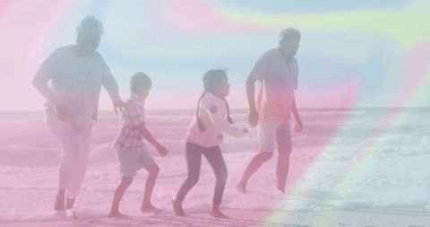 Family Bonding Walk along Sunny Sandy Shoreline