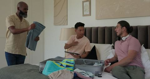 Men preparing luggage for wedding celebration occasion