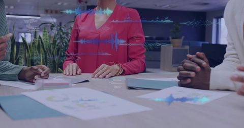 Business Leader Placing Hands on Table Leading Collaborative Meeting with AR Data Overlays