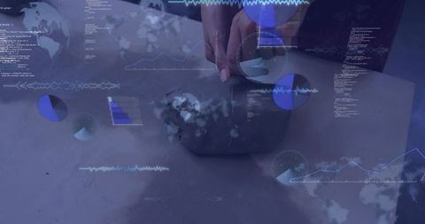 Female hands manipulating clay orb with augmented data visualization and hud overlay