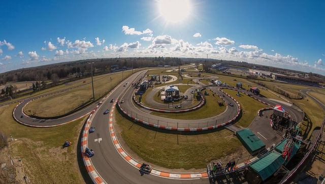 Exciting go-kart racing on sunny track