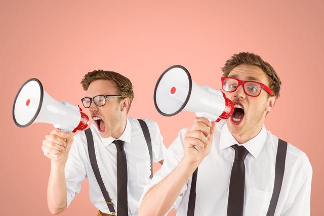 Businessman in dress shirt and glasses frustrated and shouting through a megaphone. Suitable for themes of stress, communication, expressing frustration, and business challenges.