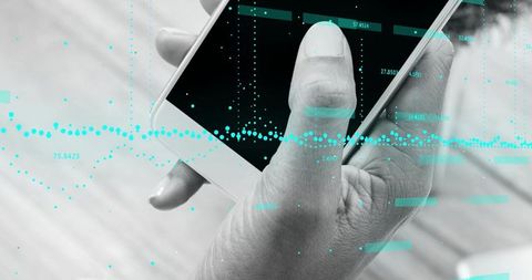 Right Hand Holding Smartphone Showing Augmented Reality Data Visualization and Analytics