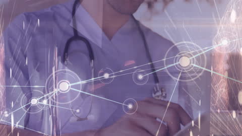 Doctor Using Digital Tablet with Network Interface in Hospital Environment