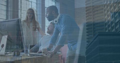 Diverse team collaborating with digital business data overlay