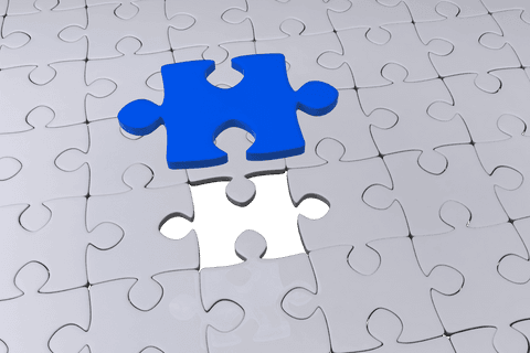 blue puzzle piece above white puzzle on transparent surface - Download Free Stock Videos Pikwizard.com
