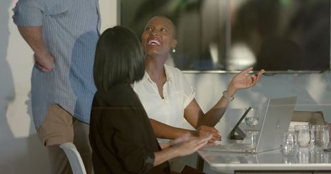 Diverse Business Professionals Collaborating in Modern Office Workspace