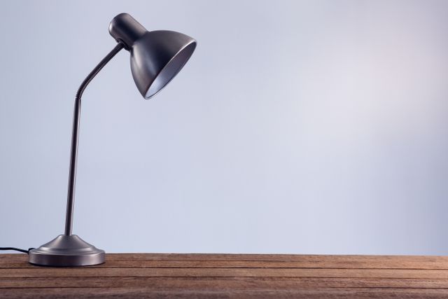 Minimalist Desk Lamp on Wooden Table - Download Free Stock Photos Pikwizard.com