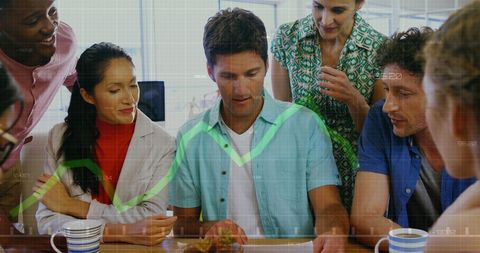 Team Analyzing Financial Data in Office Environment with Graph Overlay