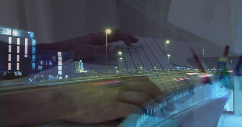 Hands on Laptop Overlaid on Fast-Paced City Traffic Scene at Night - Download Free Stock Images Pikwizard.com