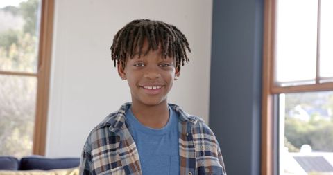 Smiling African American Boy Wearing Plaid Shirt Indoors - Download Free Stock Images Pikwizard.com