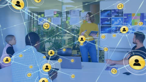 Diverse Team Discussing Strategies Amid Digital Networking Simulation