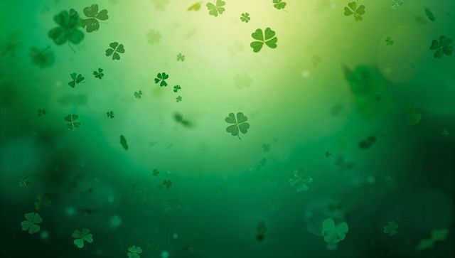 Floating four-leaf clovers over emerald gradient with bokeh glow for St Patricks backgrounds
