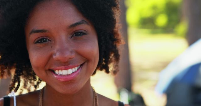 Smiling Woman Outdoors on Sunny Day - Download Free Stock Images Pikwizard.com