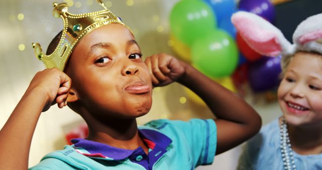 Proud Boy Wearing Crown Celebrating Birthday with Friends - Download Free Stock Images Pikwizard.com