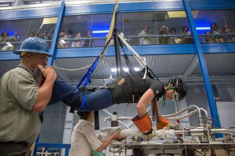 Astronaut training session for iss eva with instructor and observers