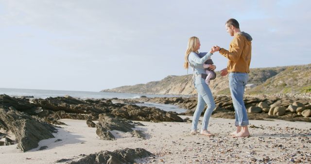 Happy family enjoying day at the beach - Download Free Stock Images Pikwizard.com