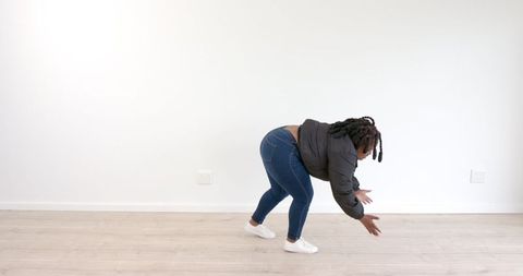 Woman Stretching in Studio for Flexibility and Wellness