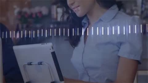 Businesswoman Analyzing Sales Data on Tablet in Modern Cafe Workspace