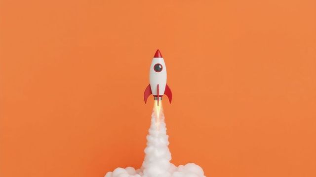 Red and White Rocket Launching Against Orange Background