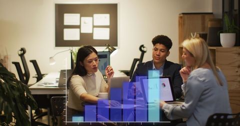 professionals collaborating on financial data in modern office - Download Free Stock Images Pikwizard.com