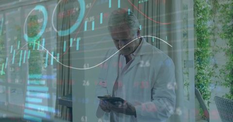 Senior Doctor Using Tablet with Financial and Clinical Data Overlay in Sunlit Home Office