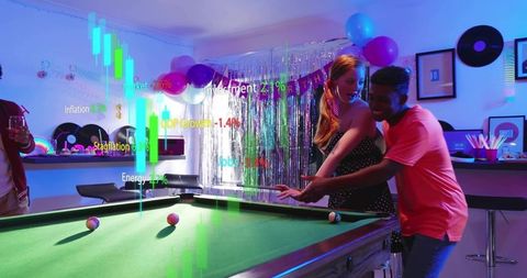 Young couple playing pool at neon party with augmented reality finance data overlay