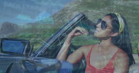 Technology Merges with Leisure: Woman in Convertible with Digital Overlay