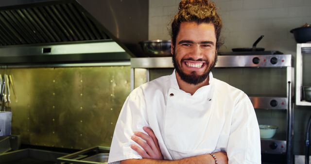 Smiling Chef With Folded Arms In Professional Kitchen - Download Free Stock Images Pikwizard.com