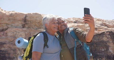 Senior Couple Hiking in Mountains Taking Selfie Smiling Sunny Day - Download Free Stock Images Pikwizard.com