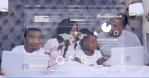 Family of four sharing laptops on bed with futuristic hud overlay