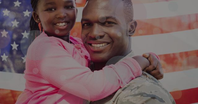 Heartwarming scene of a military father holding his daughter, both smiling, with an American flag in the background. Suitable for use in family-oriented, patriotic, and military service-related projects. Perfect for illustrating themes of family bonds, patriotism, and honoring military service.