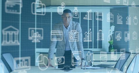 Businessman Analyzing Digital Infographics with Futuristic Icons