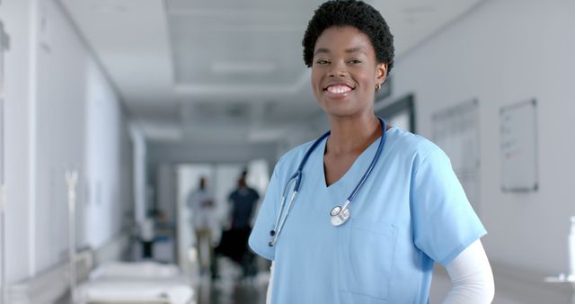 Confident African American Nurse in Hospital Hallway - Download Free Stock Images Pikwizard.com