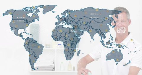 Man wearing white polo handling skincare bottle by bath shelf with world data map overlay