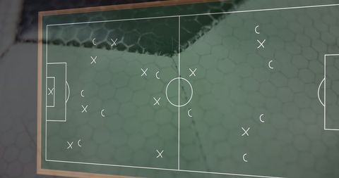 Strategic Football Game Plan on Green Chalkboard
