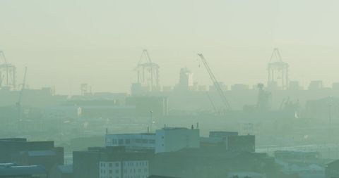 Industrial Harbor Silhouetted in Musical Green Mist - Download Free Stock Images Pikwizard.com