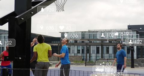 This image depicts a group of men engaging in basketball on an urban court, overlaid with social media interactions such as likes and follower counts. The social media overlays create a concept of combining sports with digital engagement, reflecting modern fitness trends and community interaction. Suitable for illustrating the intersection of sports and digital landscapes in articles, on websites promoting active lifestyles, and in content focusing on social media's impact on physical activities.