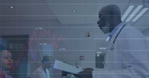 Senior Doctor Analyzing Medical Data in Modern Hospital Setting