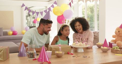 Diverse Family Celebrating Birthday in Festive Home Setting