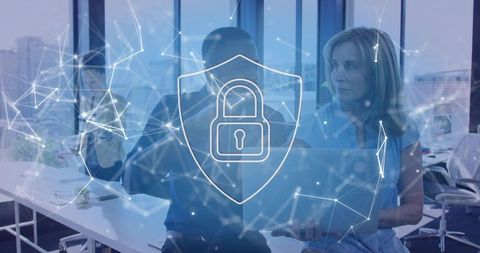 Business team collaborating on cybersecurity with digital lock overlay in modern office